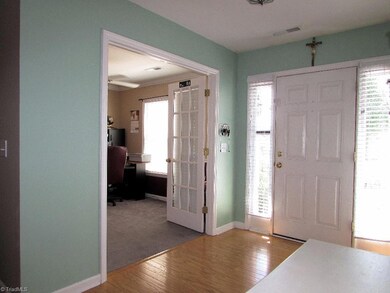 Double sidelights at the front door provide lots of natural light for the entry. Office could easily be converted to formal dining room or a 4th bedroom.