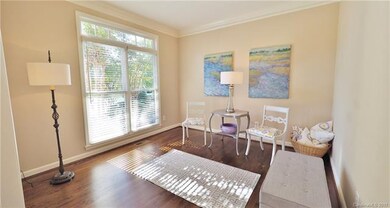 Main Level Living Room can easily be enclosed by a