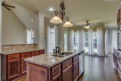 view into the eat in area of kitchen. Overlooks huge back yard 