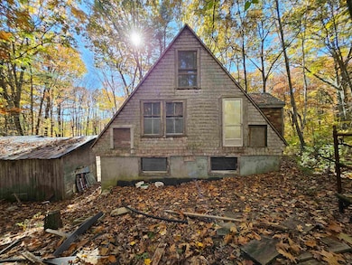 The end oposite the porch, could have its own acce