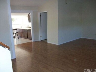 part of living room looking to kitchen