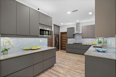 1155 Tyler St, Hollywood, FL 33019 - photo 2