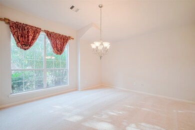 A towering window ushers in soft daylight in the f