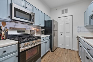Spicket Commons unit 412, Methuen, MA 01844 - photo 7