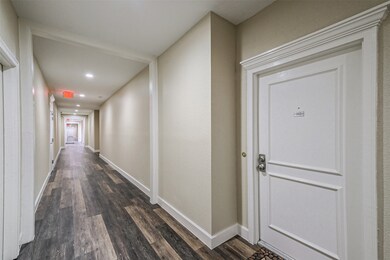 Interior hallways with new paint and flooring.