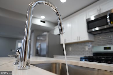 901 Whitmore Ave, Baltimore, MD 21216 - photo 4