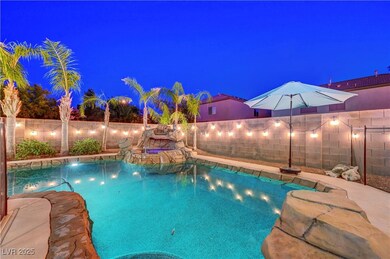 Pool at twilight featuring a fenced backyard and a