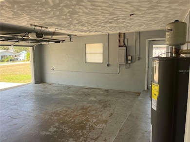 ATTACHED 2 CAR GARAGE w/ ENTRANCE INTO INTERIOR OF HOME