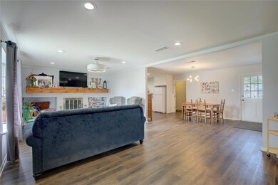 Living room featuring dark hardwood / wood-style f