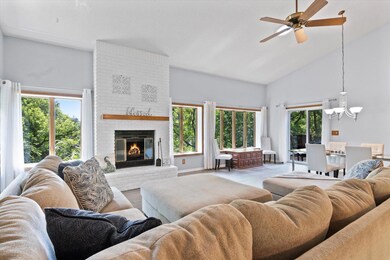 Open concept living and dining area overlooks the beautiful outdoors.  Feels like living in a tree house!