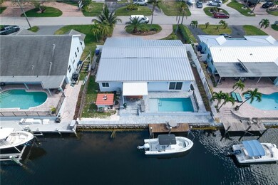 Private dock and brand new roof and pool located i