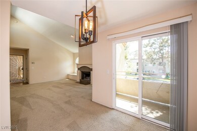 Unfurnished living room with high vaulted ceiling,
