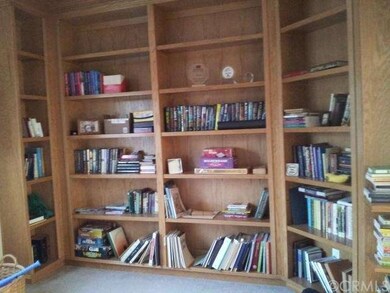 Custom built bookcase in downstairs office/den