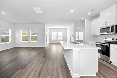 Photos are not of the actual home, but are photos of the builder home with same floorplan with similar interior finishes.