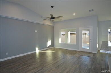 Living room w/ access to back patio