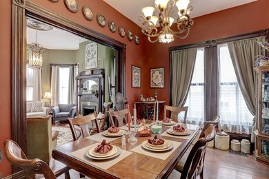Formal dining room with living room through pocket
