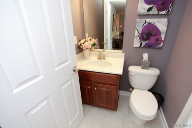 Half bath on first floor with large linen closet.