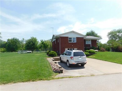 LOCATION LOCATION!  CONCRETE DRIVE WITH EXTRA PARK
