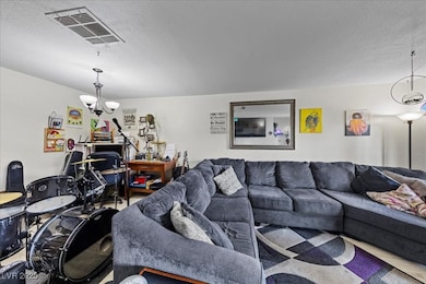 Living room with a textured ceiling