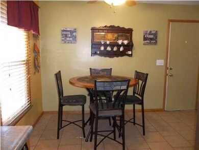 Comfortable eating space adjoins kitchen