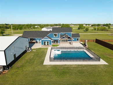 View of swimming pool featuring a fenced backyard, a patio, a yard, and a fenced in pool