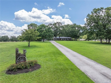 View of home's community featuring a lawn