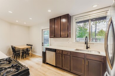 Kitchen with stainless steel appliances, tasteful