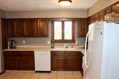 Kitchen with rear yard view