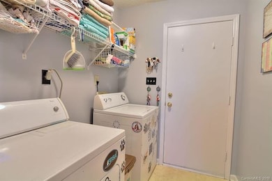 Laundry room leading to garage.