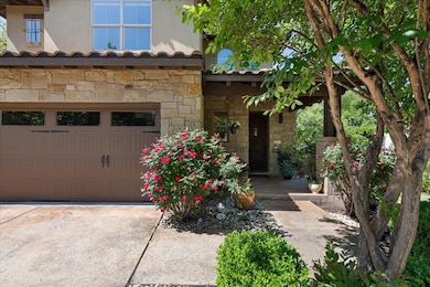 Doorway to property featuring stucco siding and s