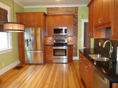 Opposite view of Kitchen; All new appliances are y