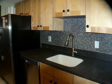 Kitchen. Also new stainless steel refrigerator