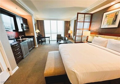 Bedroom with crown molding, a sink, expansive wind
