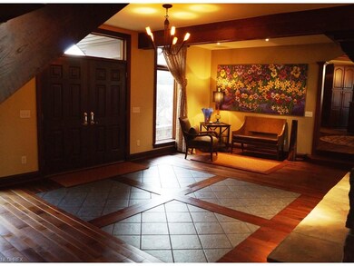 GRAND ENTRANCE INTO THE LUXURIOUS FOYER