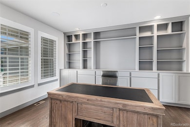 The conveniently located office is right off the entry.