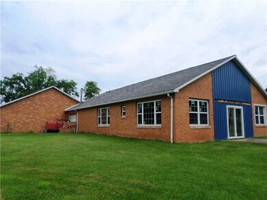 Exterior Back. Rear addition has newer windows and