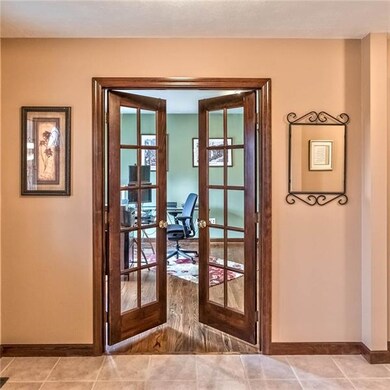 Double glass doors open from the foyer to the 1st 