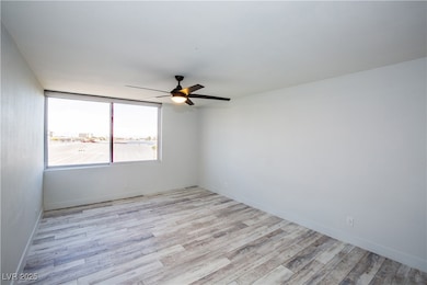 Empty room featuring light wood-style flooring and