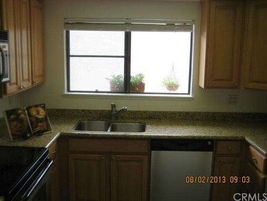 Remodeled kitchen with stainless steel appliances.