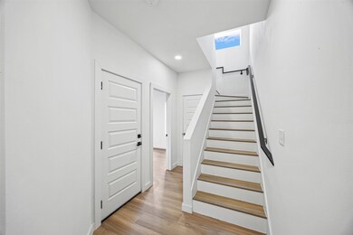 Bright and welcoming interior entryway with durabl