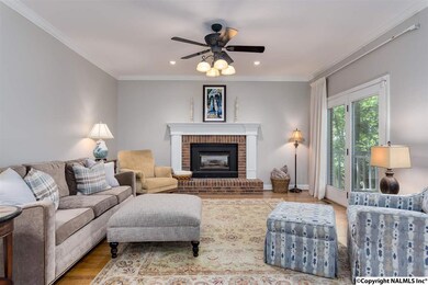 Wood Floors, Gas Log Fireplace, and Crown Molding!