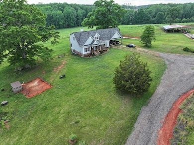 Long driveway to the house; 86 acres