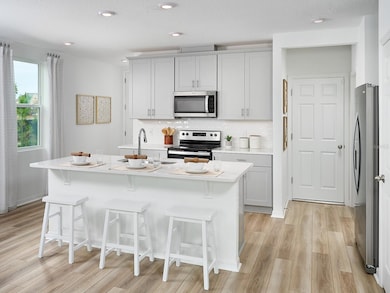 Photo is not of the actual home, but is an inspirational photo of builder’s model home and may depict options, furnishings, and/or decorator features that are not included
