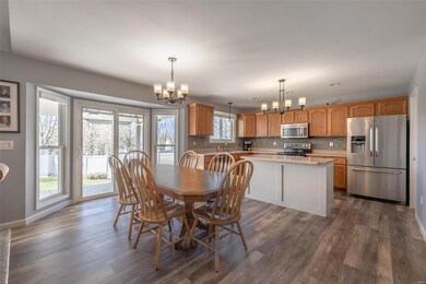 Breakfast room open to kitchen with doors to walk 