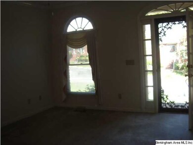 Very large living room looking outside