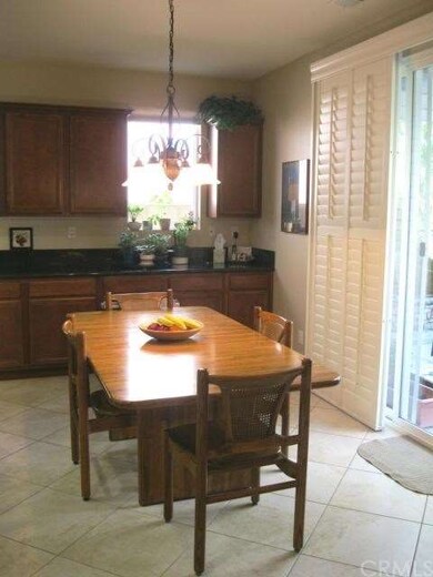 Casual eating area in kitchen, with sliding glass 