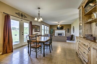 Spacious eat in kitchen-open to fireplace