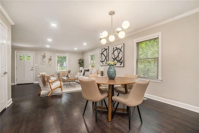 Dining area featuring ornamental molding, healthy 