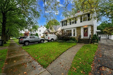 View of front of property with a front yard