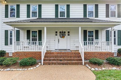 The charming front porch is perfect for a lazy Sun